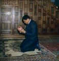 Muhammad Ali in prayer.jpg