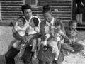 Muhammad Ali with his second wife Belinda Boyd and their four children.jpg