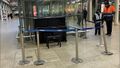 Elton Johns Piano at St Pancras station cordoned off and guarded by security.jpg
