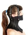 Mouth corset in leather with straps.jpg