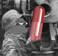 Pepe the Frog loads a howitzer with a Red Pill.jpg